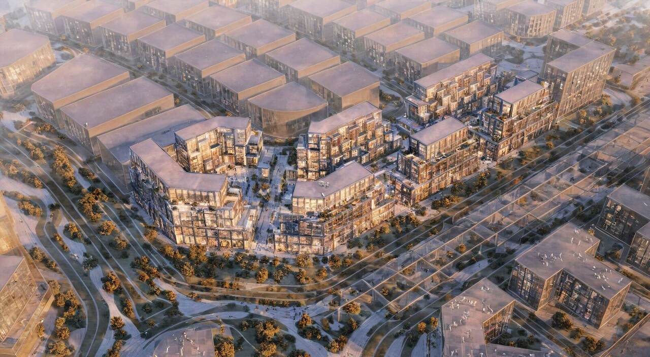 Aerial daytime render showing Avenew within its Dubai South context