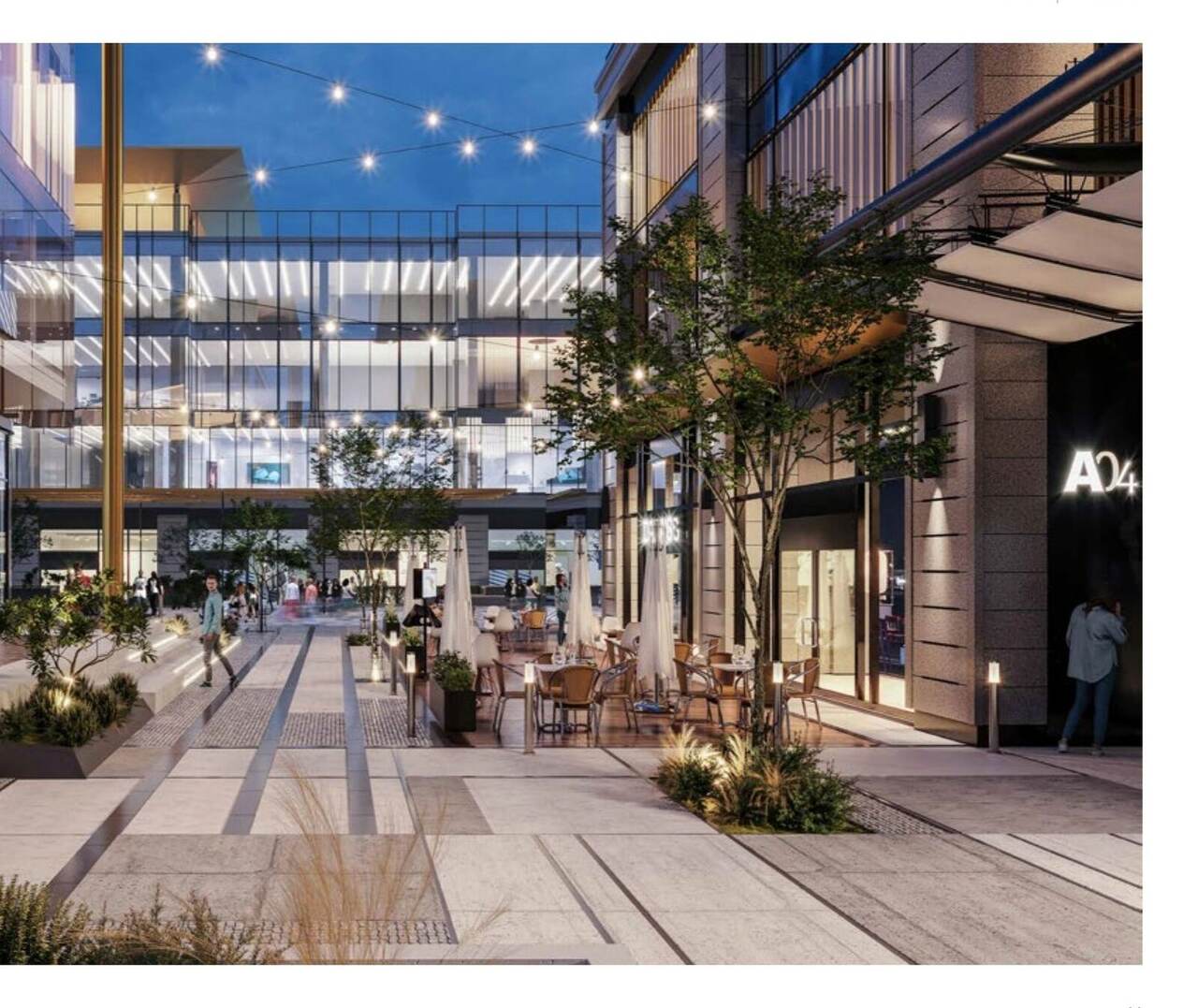 Dusk render of the Zara-anchored mall corridor